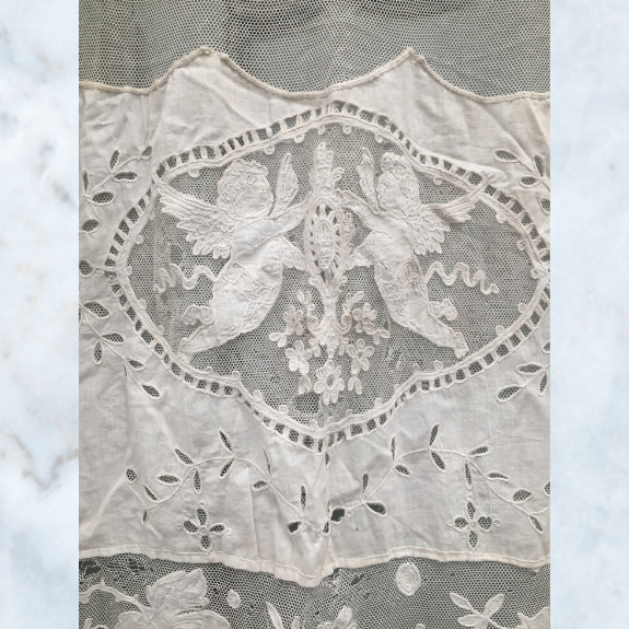 Antique French lace & cherub curtain panel